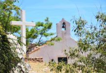 “God demonstrates his own love for us”