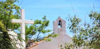 “God demonstrates his own love for us”