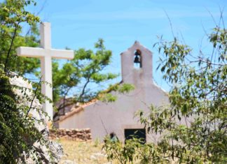 “God demonstrates his own love for us”